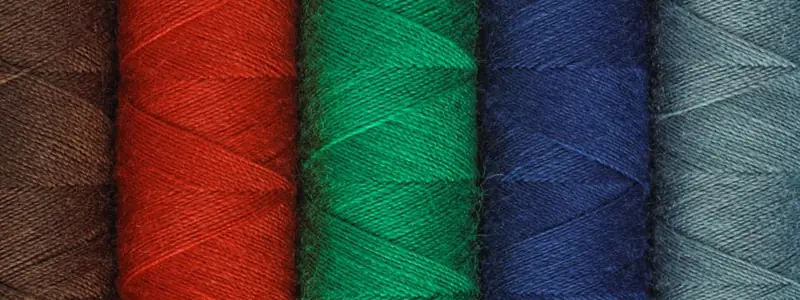 Spools of red, green and blue thread