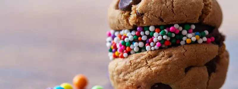Cookie sandwich with coloured sprinkles